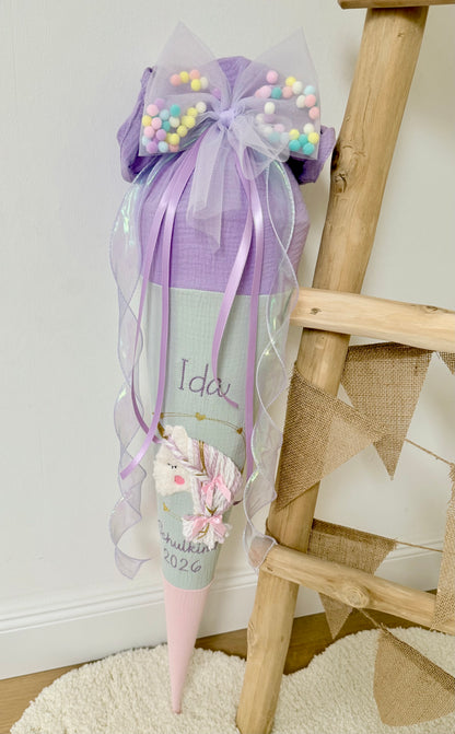 Musselin Schultüte 70 cm Wuschelkopf Einhorn  – personalisiert inkl. Rohling & Pompon Tüllschleife, optional mit Kissen-Inlett