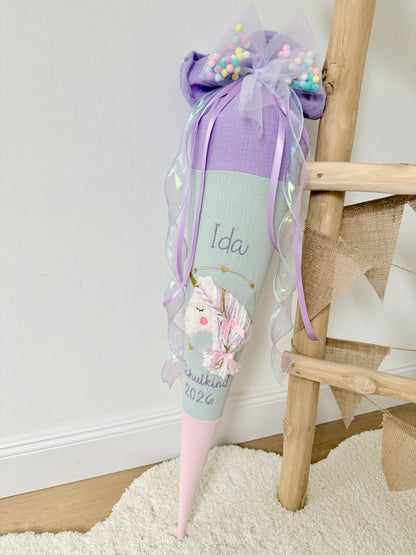 Musselin Schultüte 70 cm Wuschelkopf Einhorn  – personalisiert inkl. Rohling & Pompon Tüllschleife, optional mit Kissen-Inlett